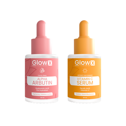 Two GlowX skincare serum bottles, one pink and one orange, on a white background.
