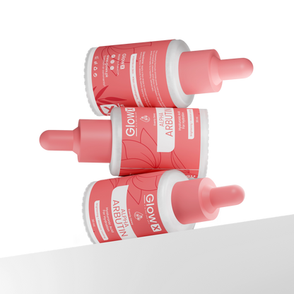 Three Glowx bottles of Glow Recipe Alpha Arbutin serum on a white background
