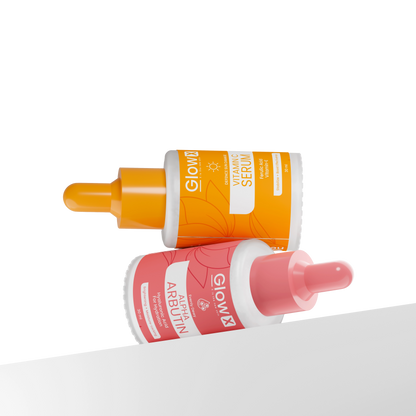 Two skincare serum bottles with orange and pink labels on a white background Glowx